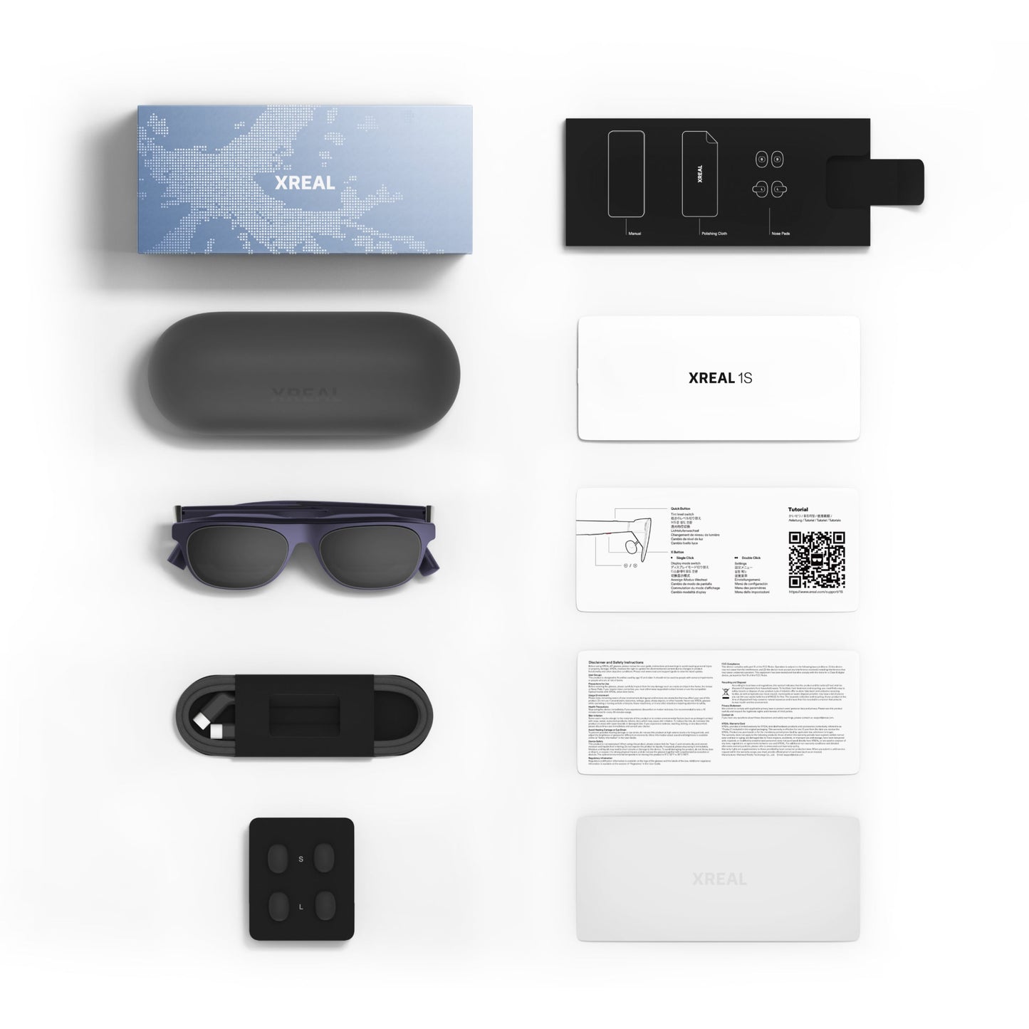 XREAL 1S product packaging with glasses, and accessories on a white background