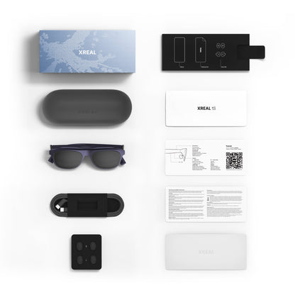XREAL 1S product packaging with glasses, and accessories on a white background
